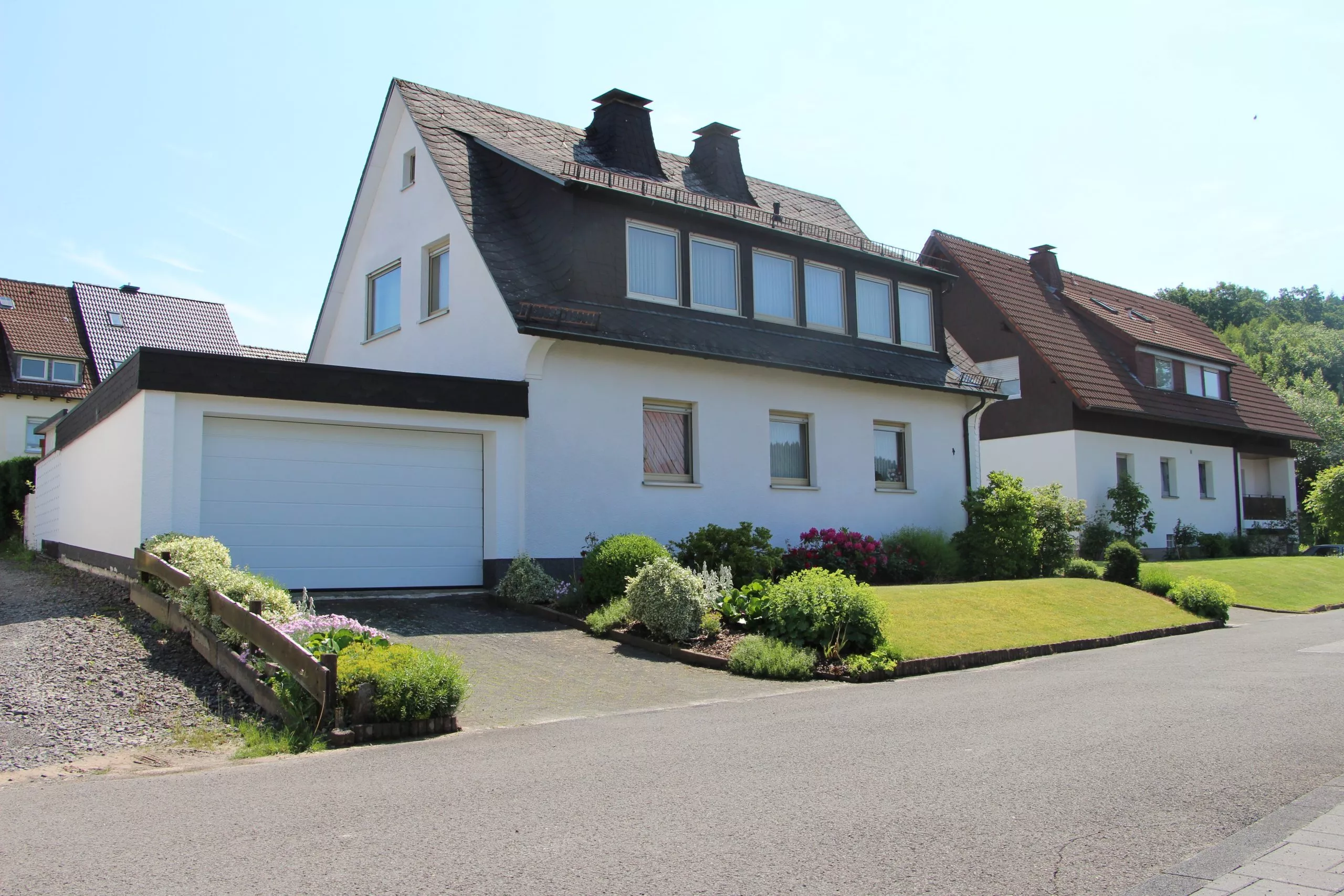 Volksbank immoXperten GmbH & Co. KG - Immobilienangebot - 57439 Attendorn - Attendorn-Ort - Einfamilienhaus - Familienfreundliches Wohnhaus mit großem Familiengarten in Attendorn!