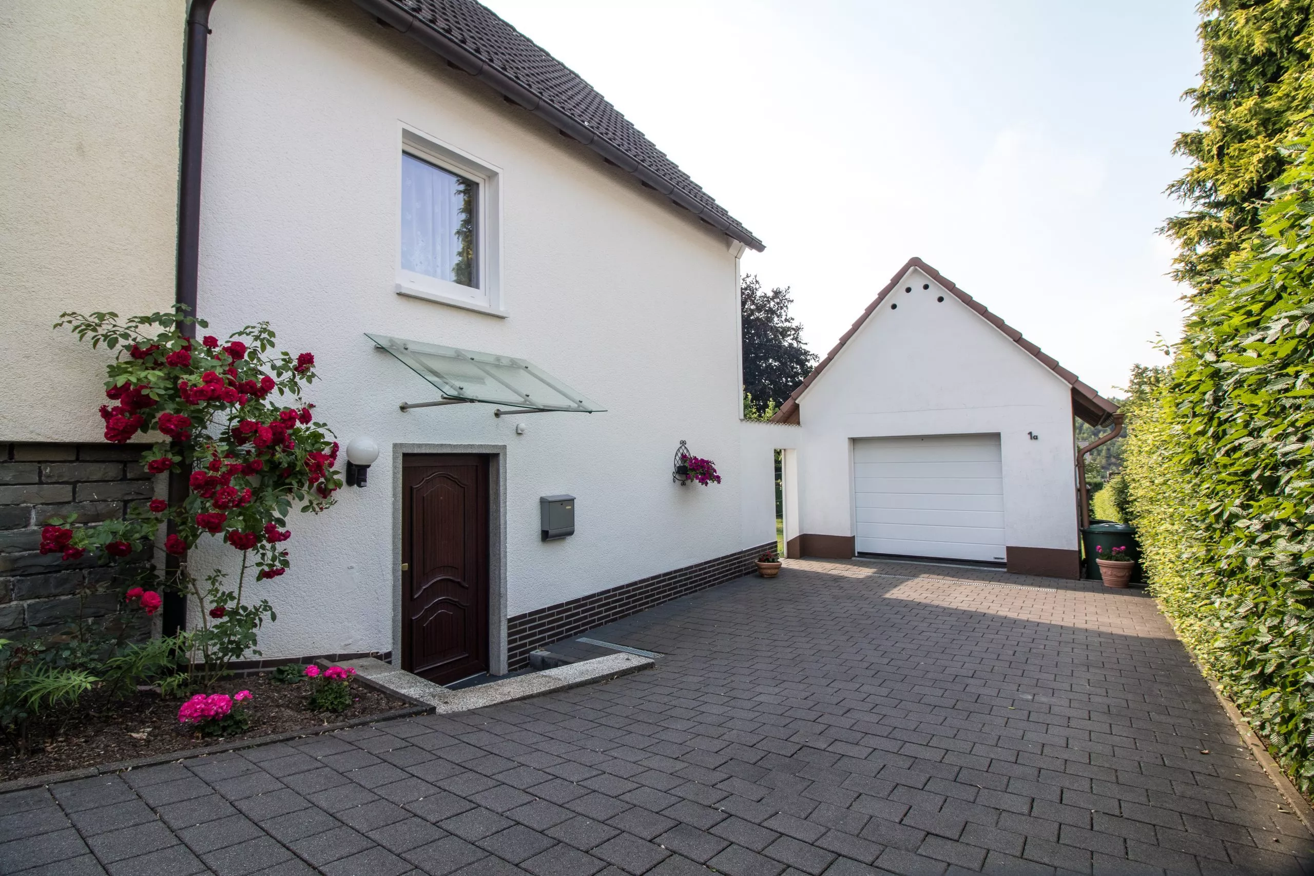 Volksbank immoXperten GmbH & Co. KG - Immobilienangebot - 57462 Olpe - Lütringhausen - Doppelhaushälfte - Ihre Alternative zur Miete - großer Garten für Ihren Hund!