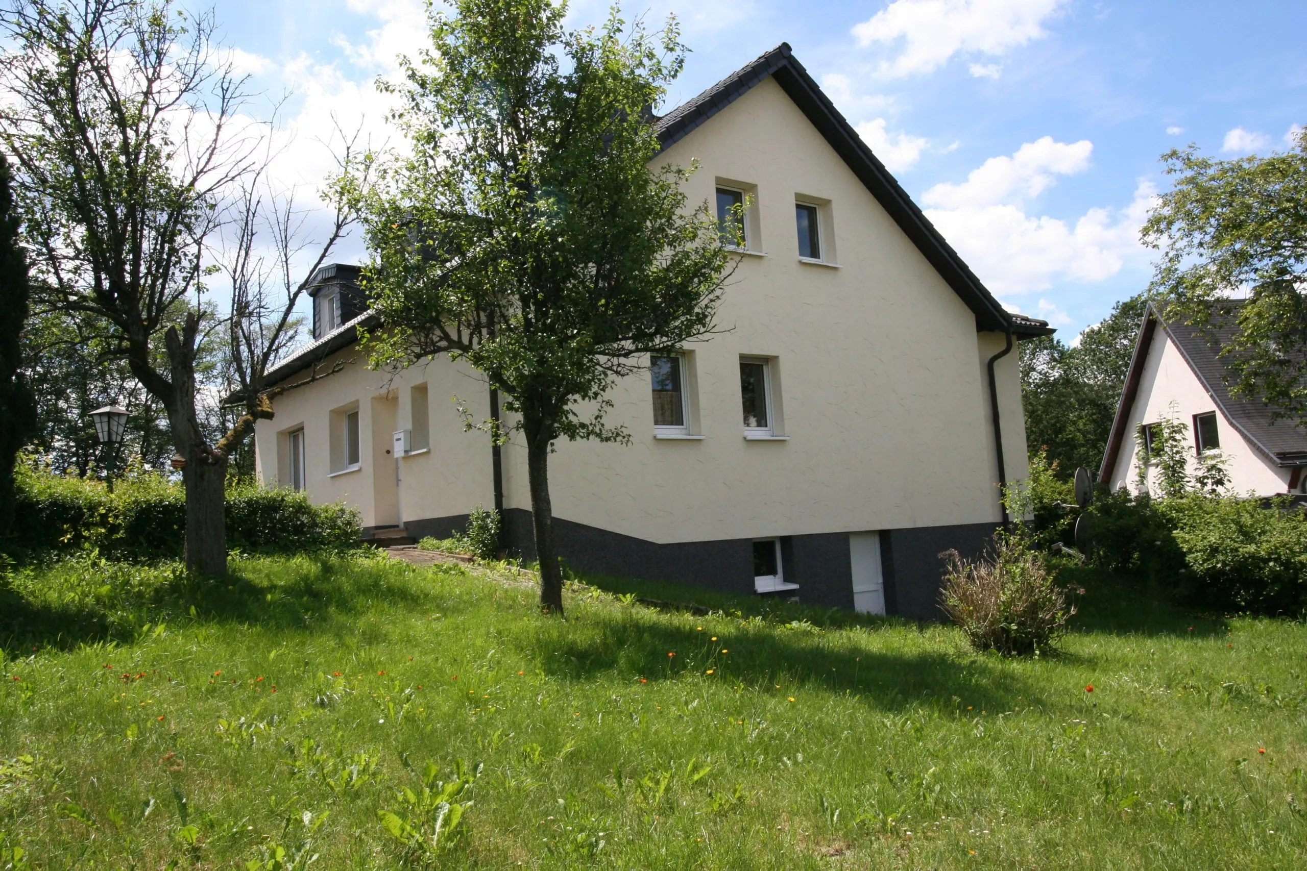 Volksbank immoXperten GmbH & Co. KG - Immobilienangebot - 57462 Olpe - Rhode - Häuser - Freistehendes Einfamilienhaus in Rhode mit großem Garten!