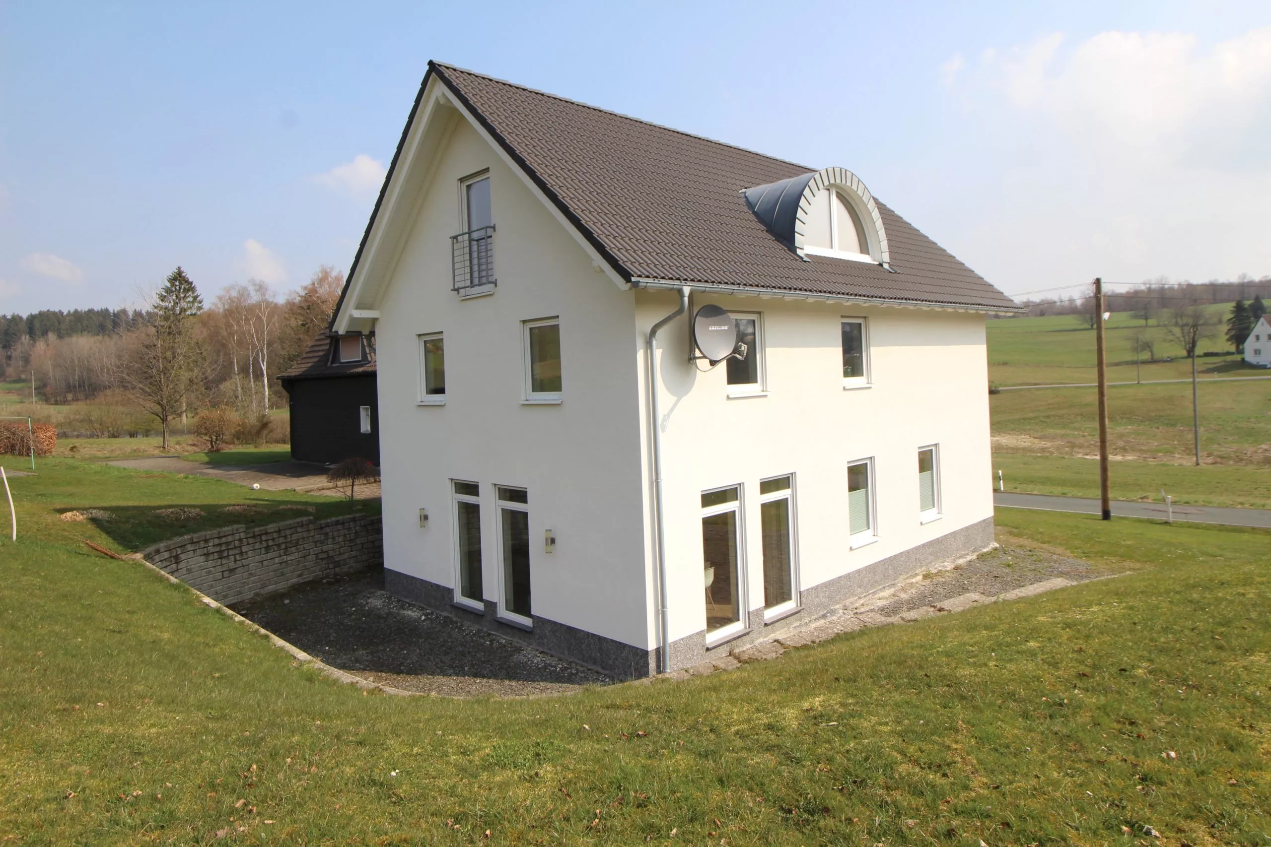 Volksbank immoXperten GmbH & Co. KG - Immobilienangebot - 57482 Wenden Schwarzbruch - Wenden - Häuser - Für Wohngenießer! Neuwertiges Einfamilienhaus in Wenden-Schwarzbruch!